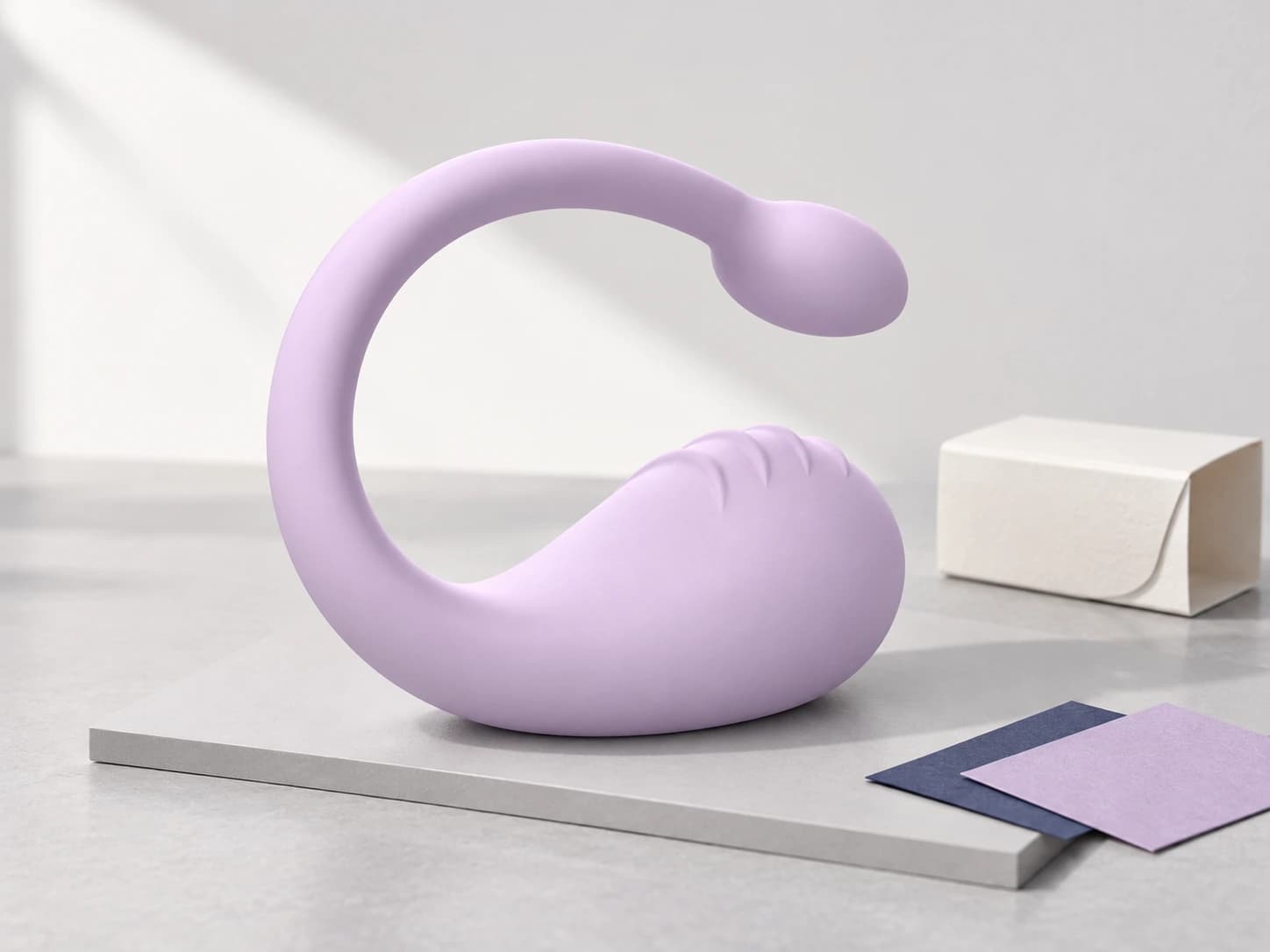 Product visualization of lavender B885 on a grey display board with a paperboard sleeve and color cards